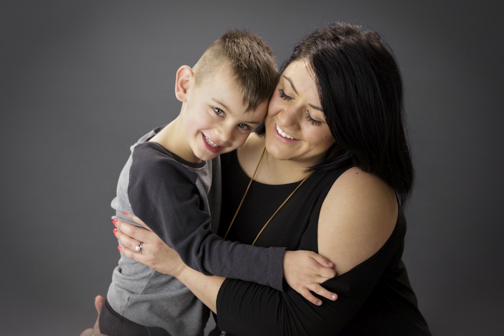 mother and son cuddle
